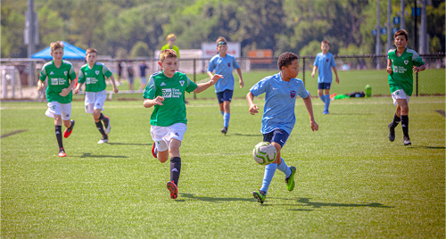 boys playing soccer